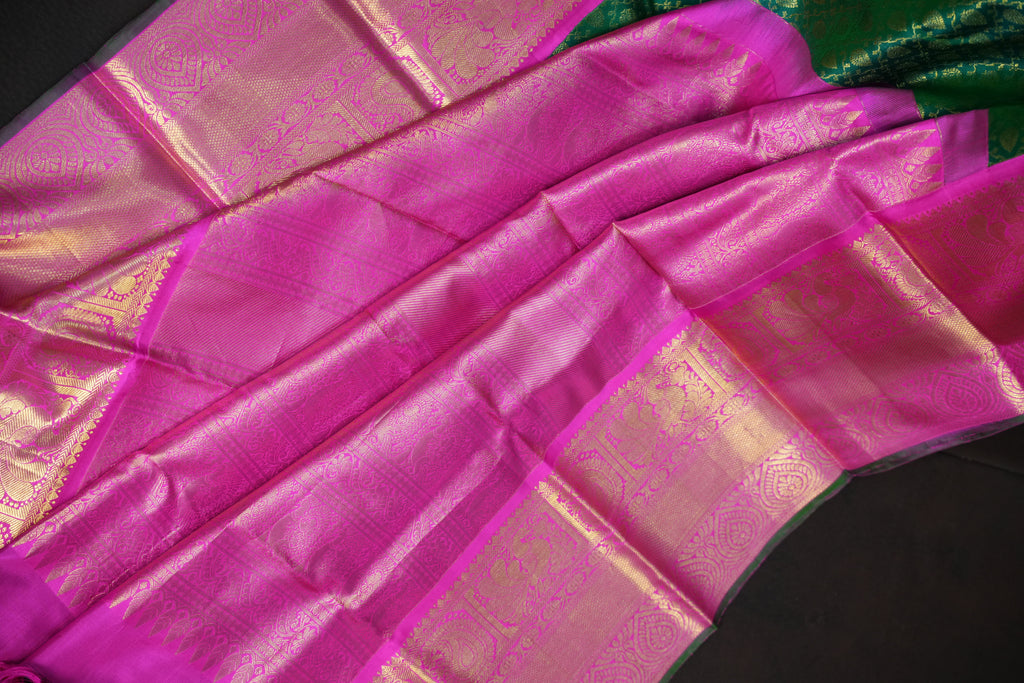 Green Kanchi Pattu Saree with Pink Zari Border