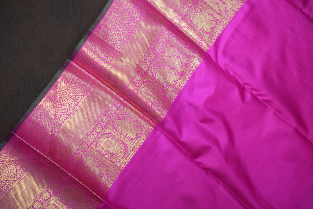 Green Kanchi Pattu Saree with Pink Zari Border