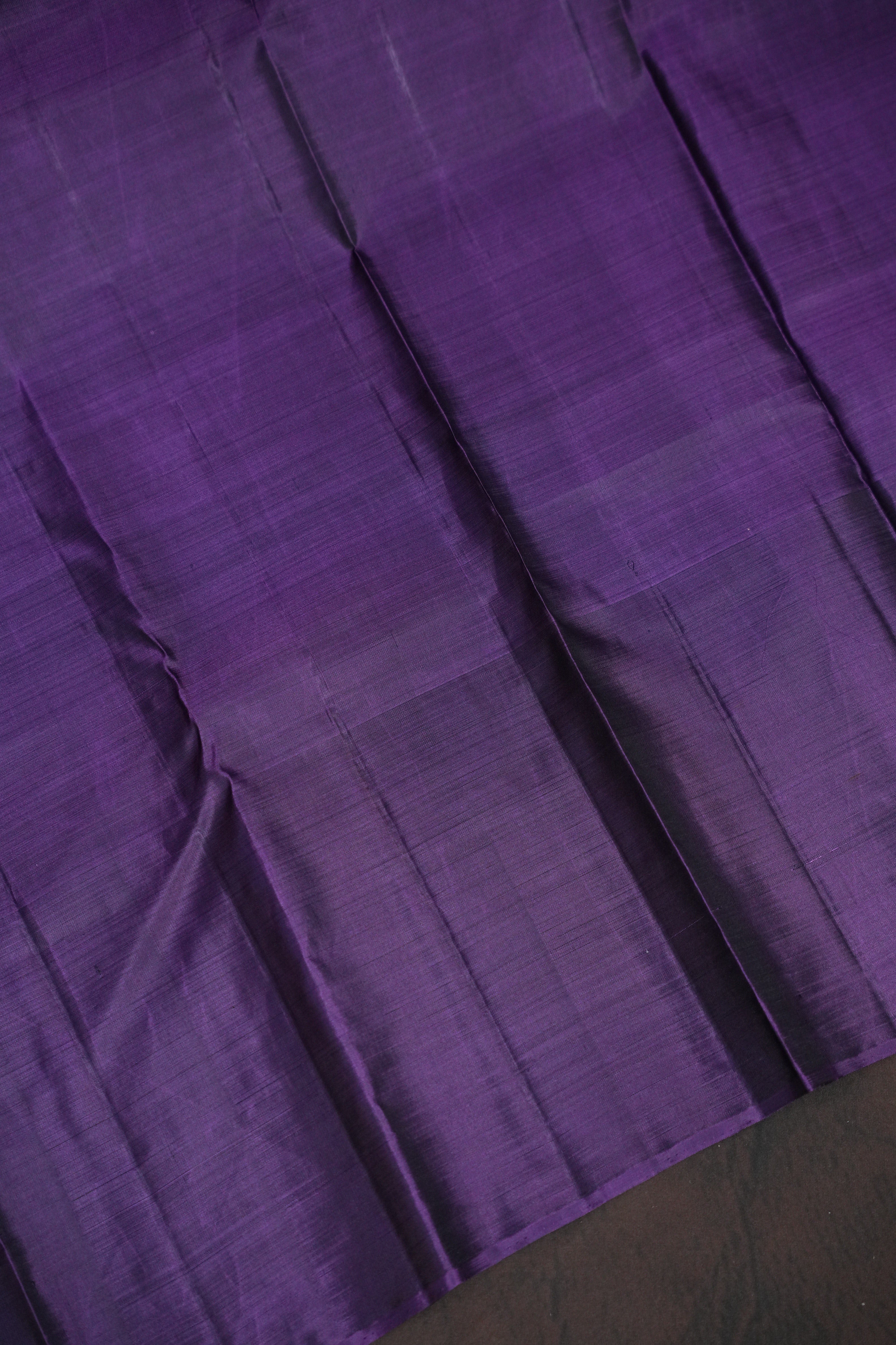 Green Kanchi Pattu Saree with Purple Zari Border