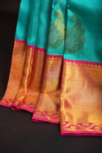 Turquoise Kanchi Pattu Saree with Pink Zari Border