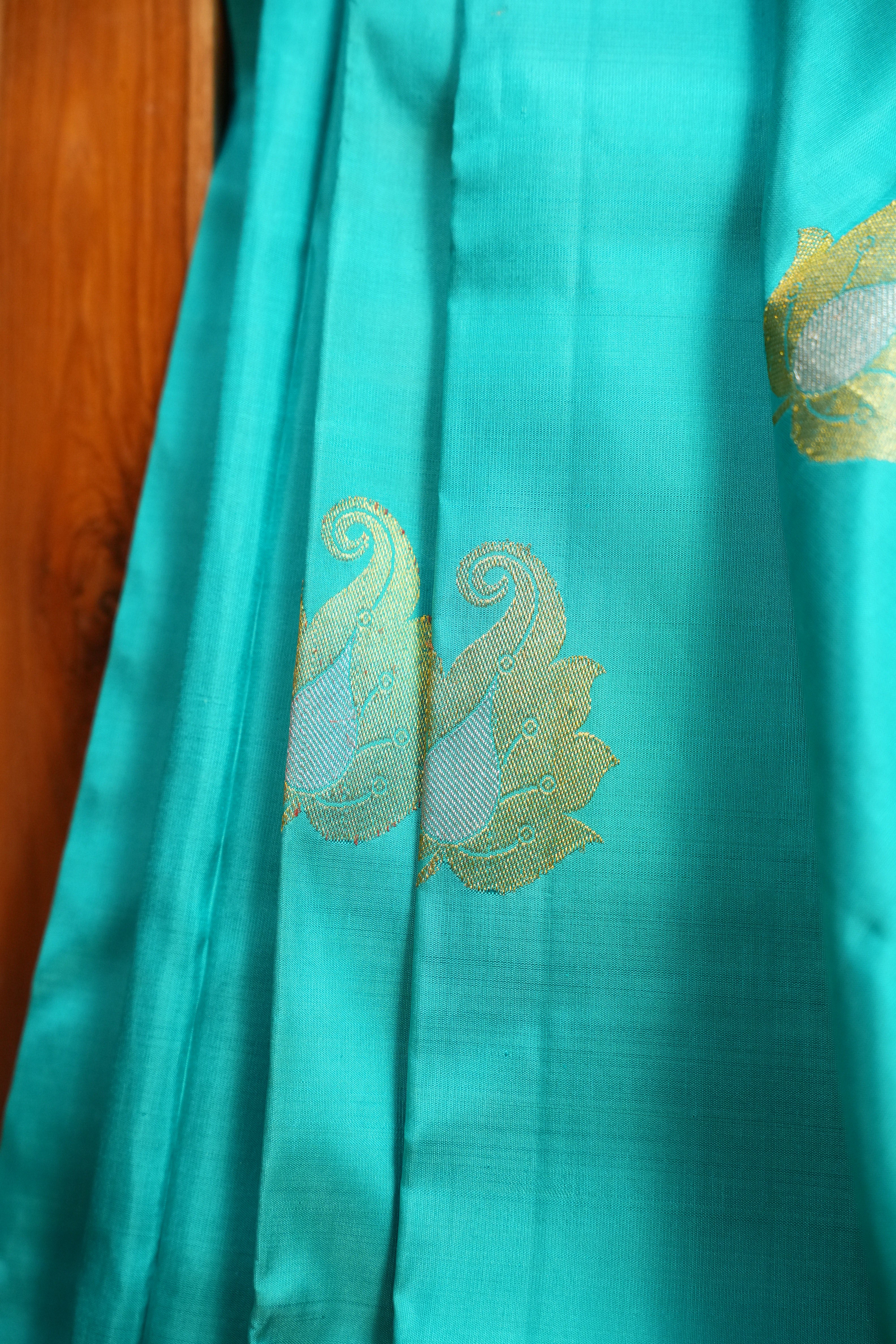 Turquoise Kanchi Pattu Saree with Pink Zari Border