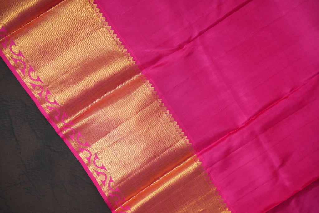 Turquoise Kanchi Pattu Saree with Pink Zari Border
