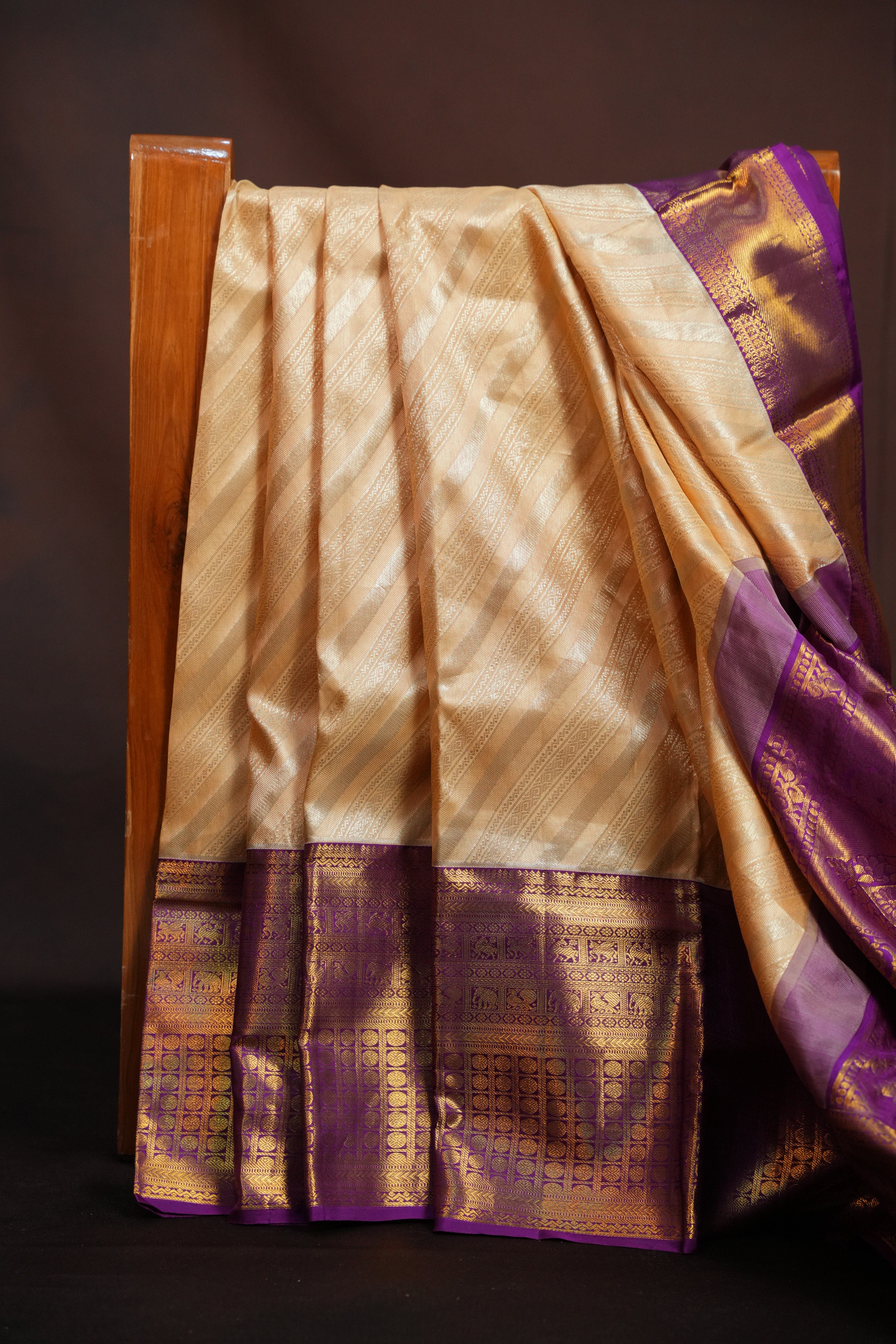 Cream Kanchi Pattu Saree with Royal Purple Zari Border