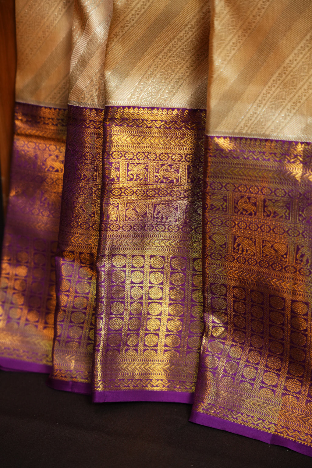 Cream Kanchi Pattu Saree with Royal Purple Zari Border