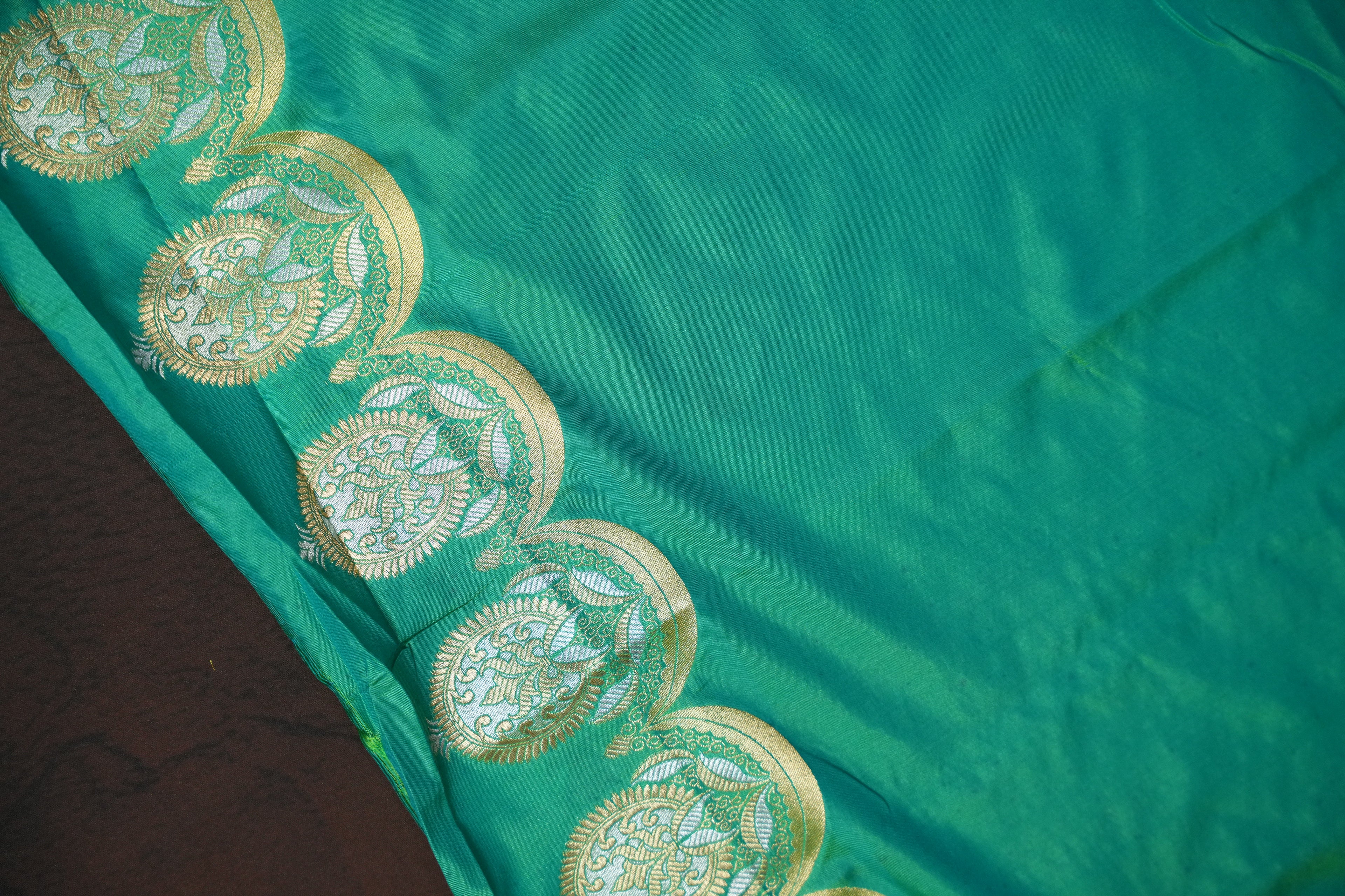 Emerald Green Banaras Saree with Silver Zari Buttas