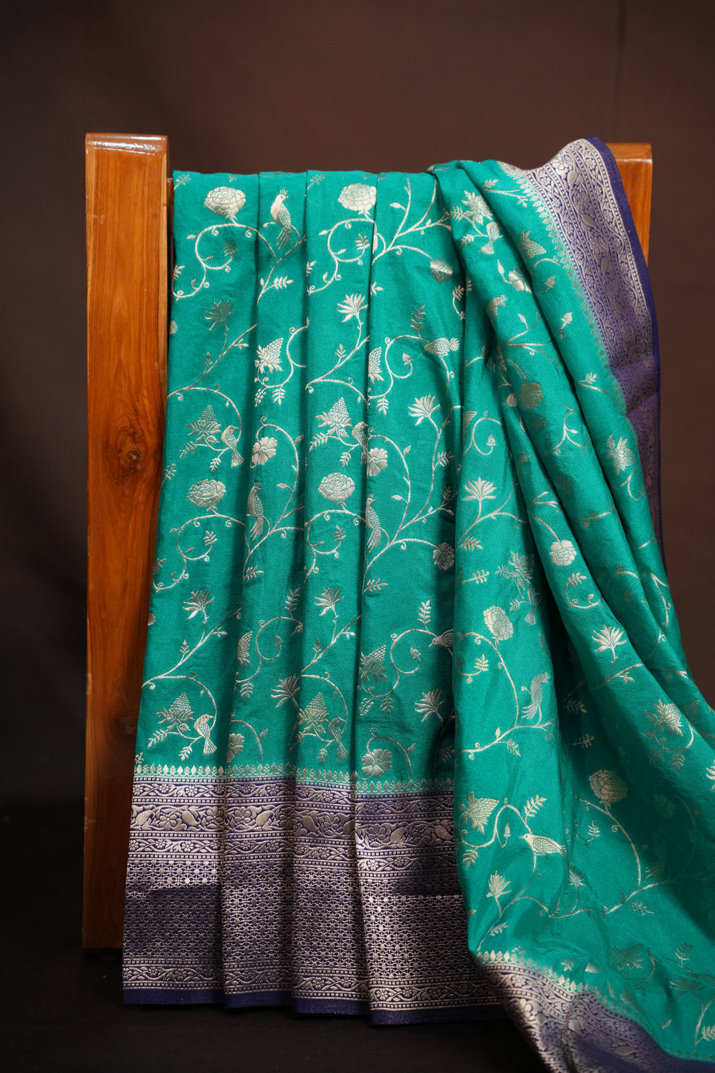 Turquoise Fancy Banaras Saree with Silver Bird & Floral Weaving