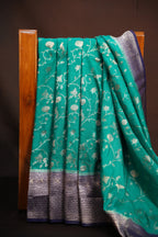 Turquoise Fancy Banaras Saree with Silver Bird & Floral Weaving