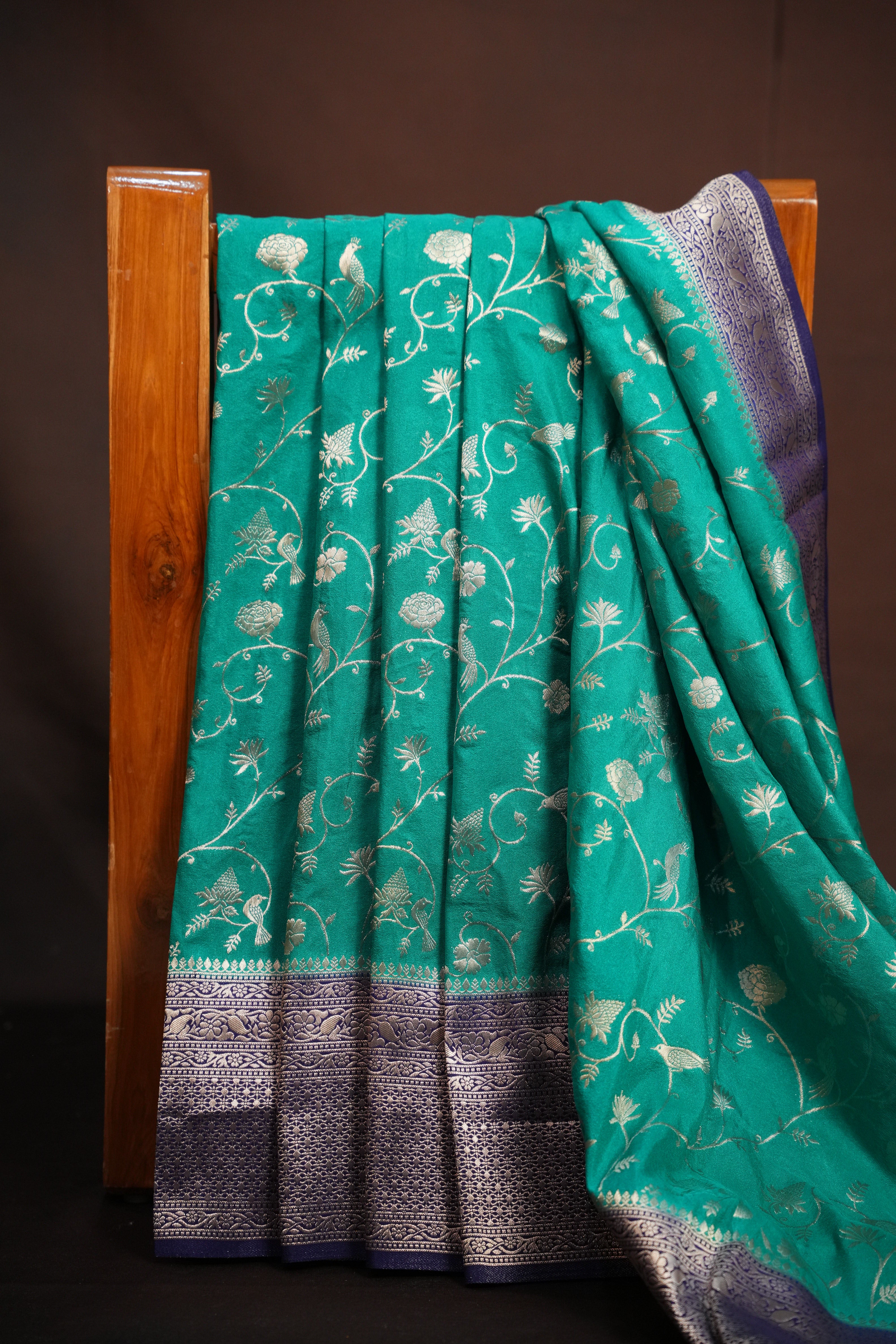 Turquoise Fancy Banaras Saree with Silver Bird & Floral Weaving