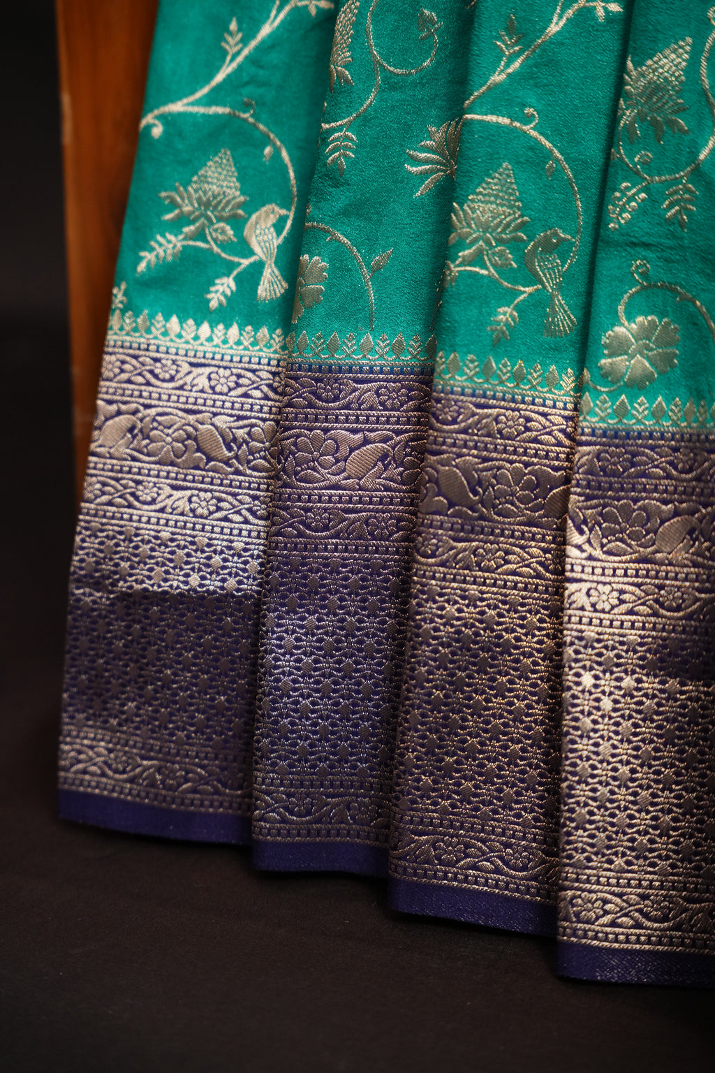 Turquoise Fancy Banaras Saree with Silver Bird & Floral Weaving