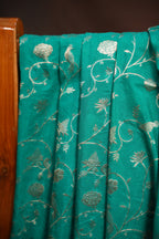 Turquoise Fancy Banaras Saree with Silver Bird & Floral Weaving