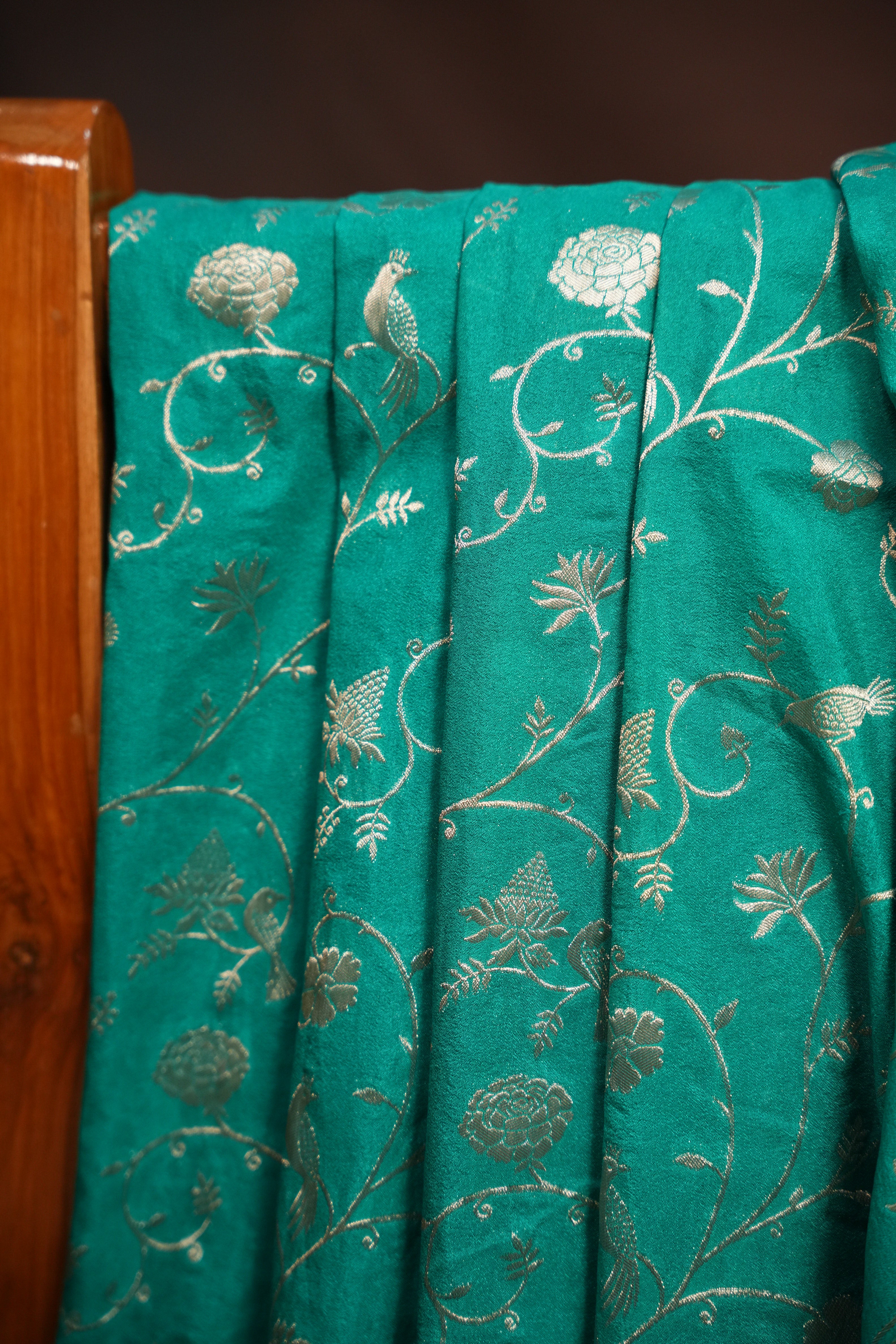 Turquoise Fancy Banaras Saree with Silver Bird & Floral Weaving