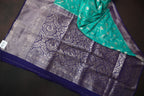 Turquoise Fancy Banaras Saree with Silver Bird & Floral Weaving