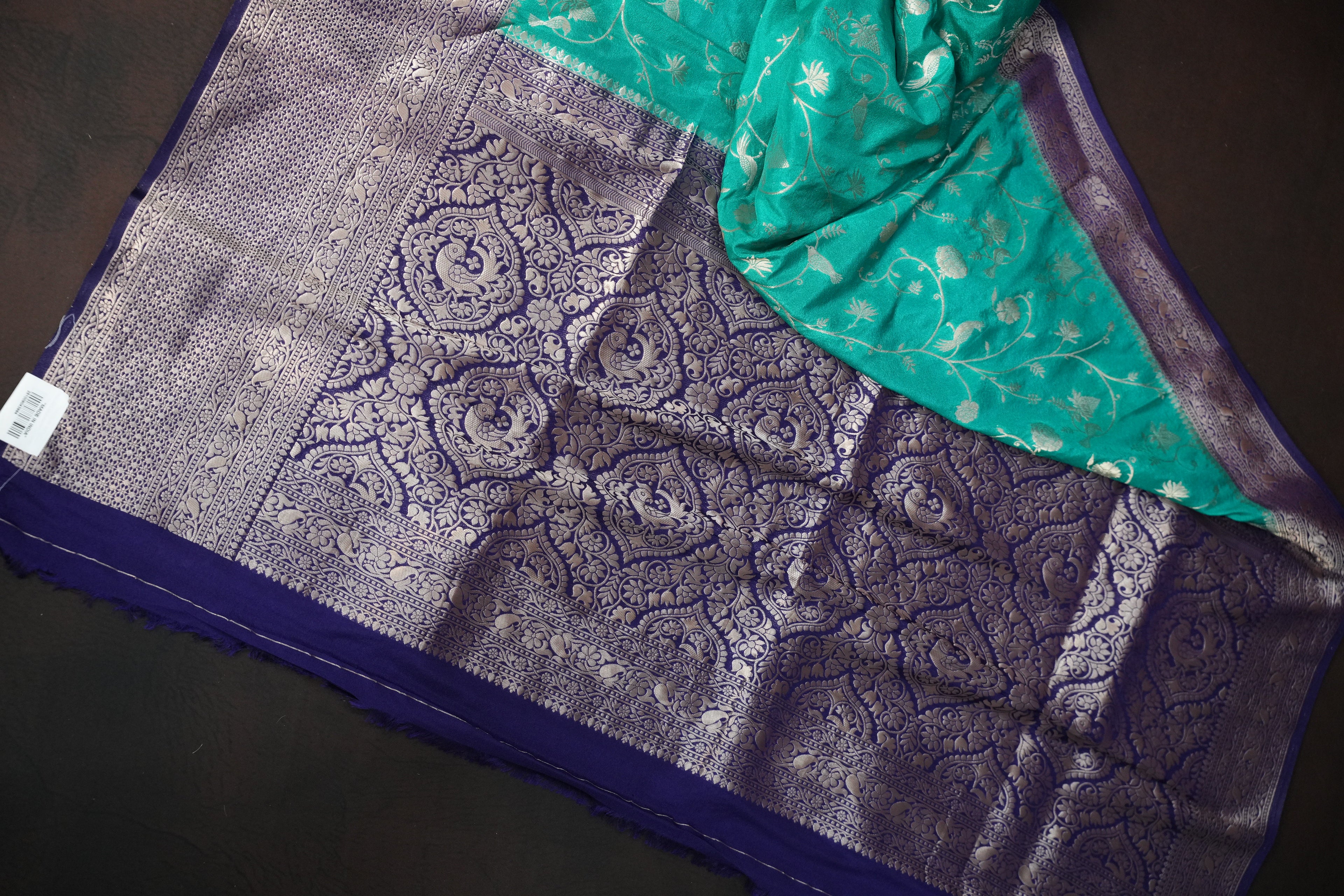 Turquoise Fancy Banaras Saree with Silver Bird & Floral Weaving