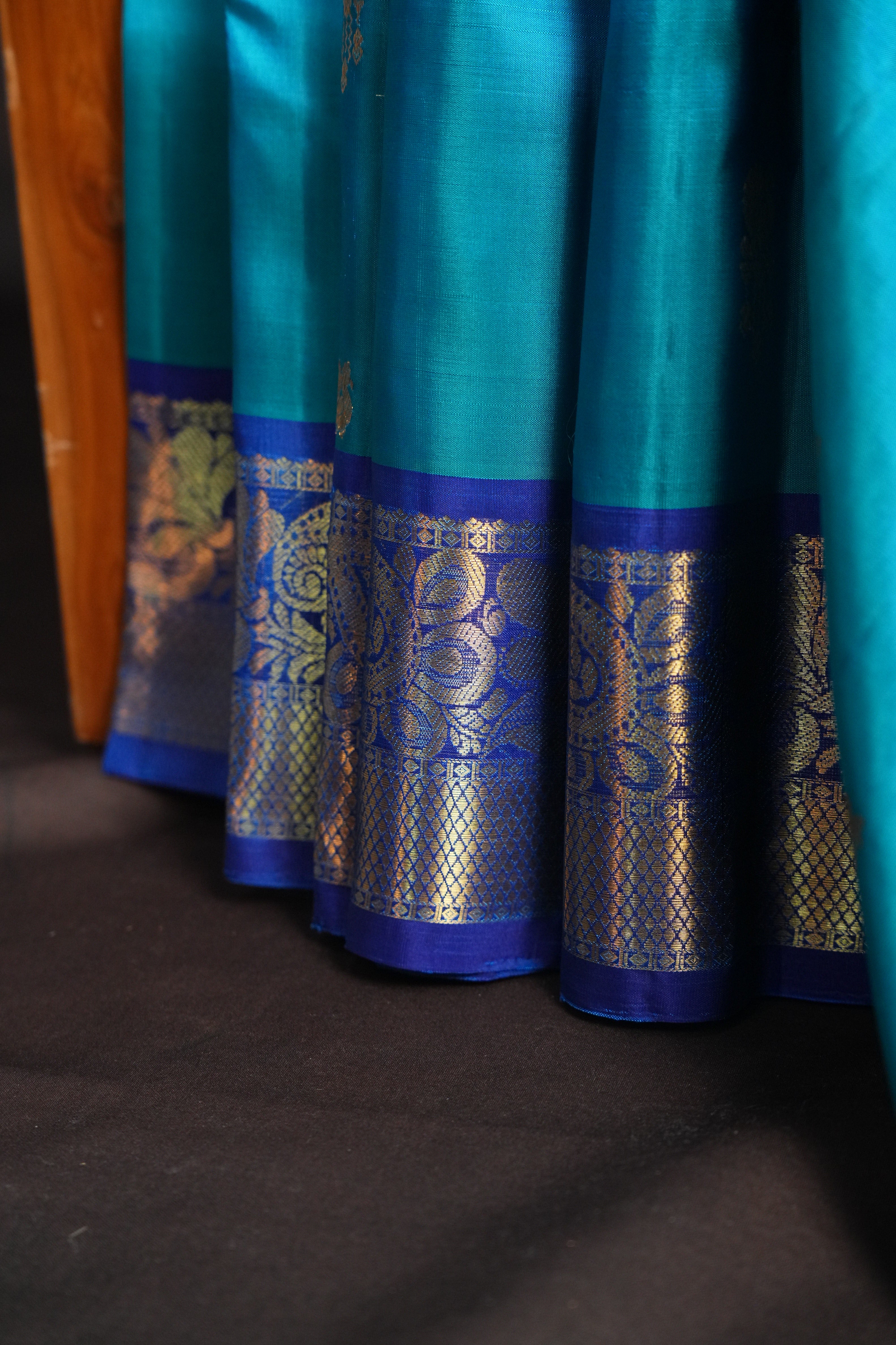 Turquoise Blue Kanchi Vintage Silk Saree with Royal Zari Border