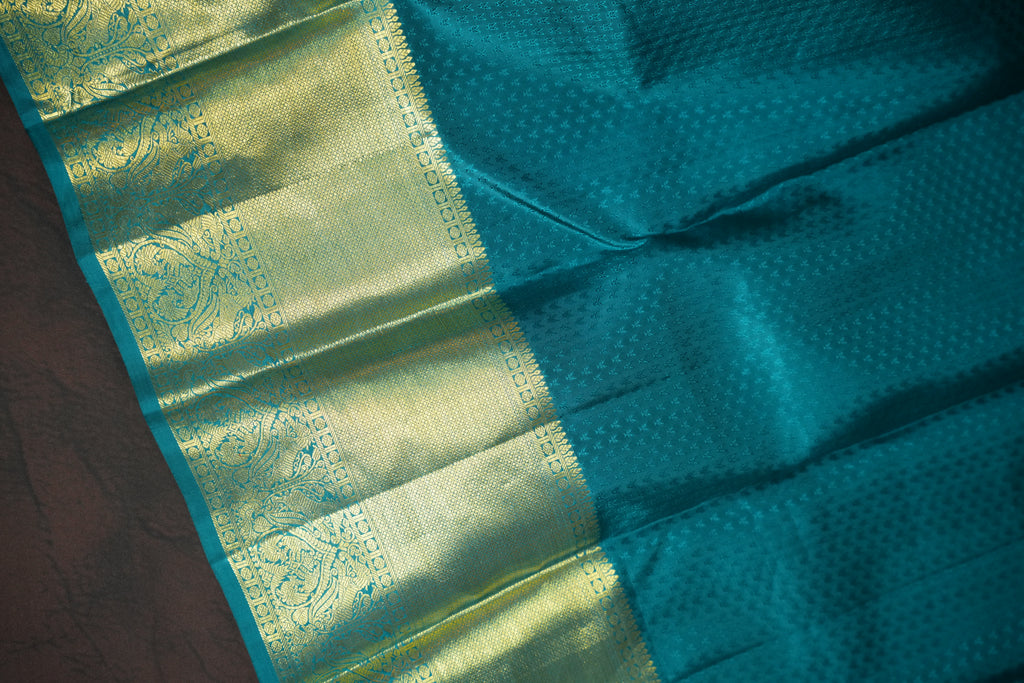 Cream Gold Kanchi Bridal Saree with Teal Zari Border
