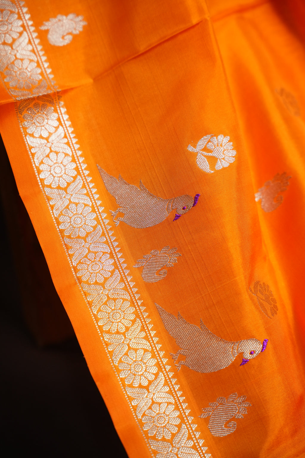 Orange Maharani Pattu Saree with Silver Peacock Motifs