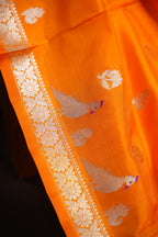 Orange Maharani Pattu Saree with Silver Peacock Motifs